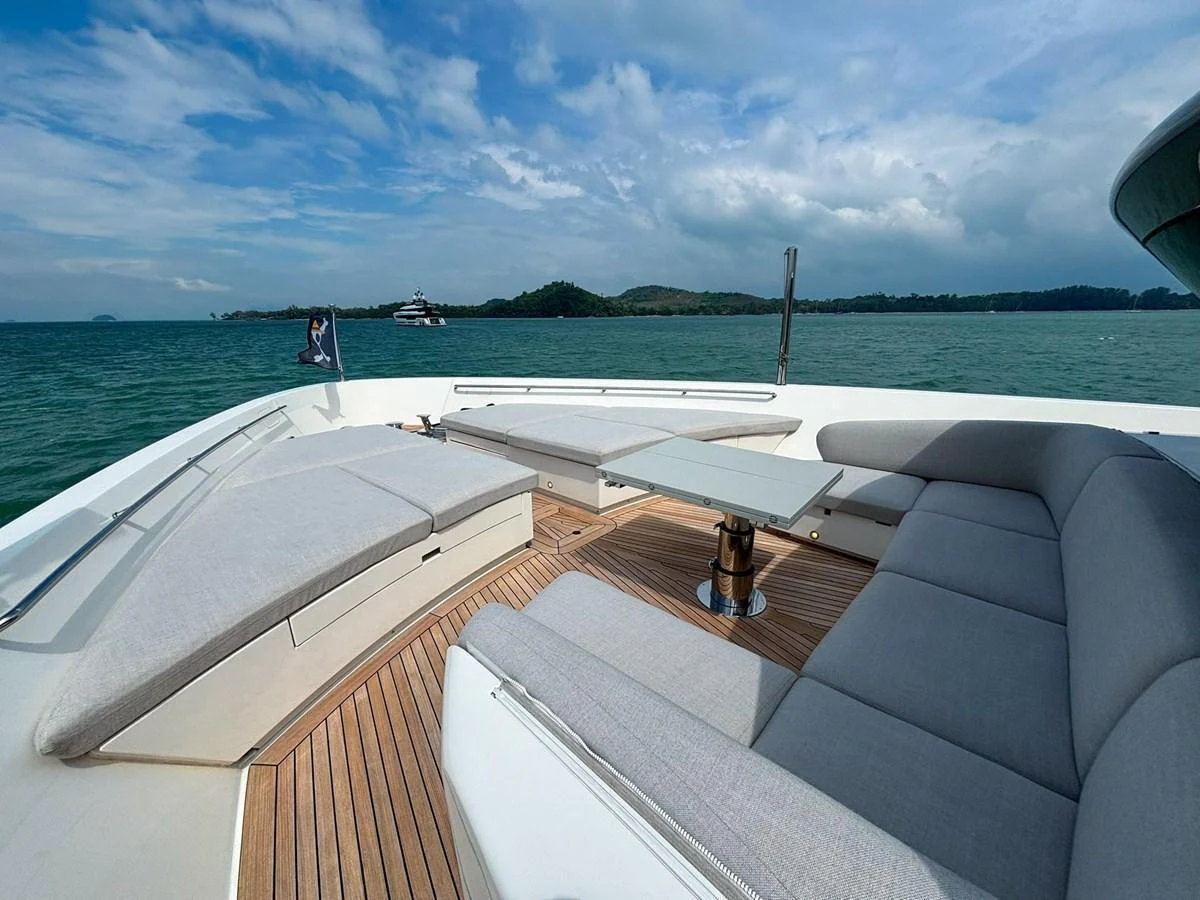 The foredeck features spacious, cushioned seating areas with a stunning view of the surrounding waters. aboard SANLORENZO SX88 Yacht for Sale