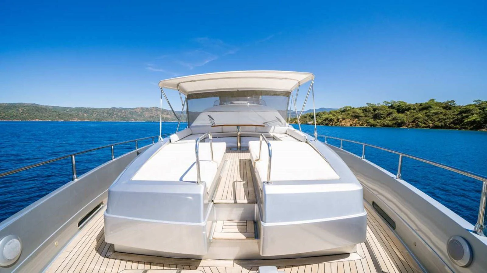 The foredeck of the yacht features spacious sunbeds and a sleek design, perfect for relaxation under the sun. aboard SILVER Yacht for Sale