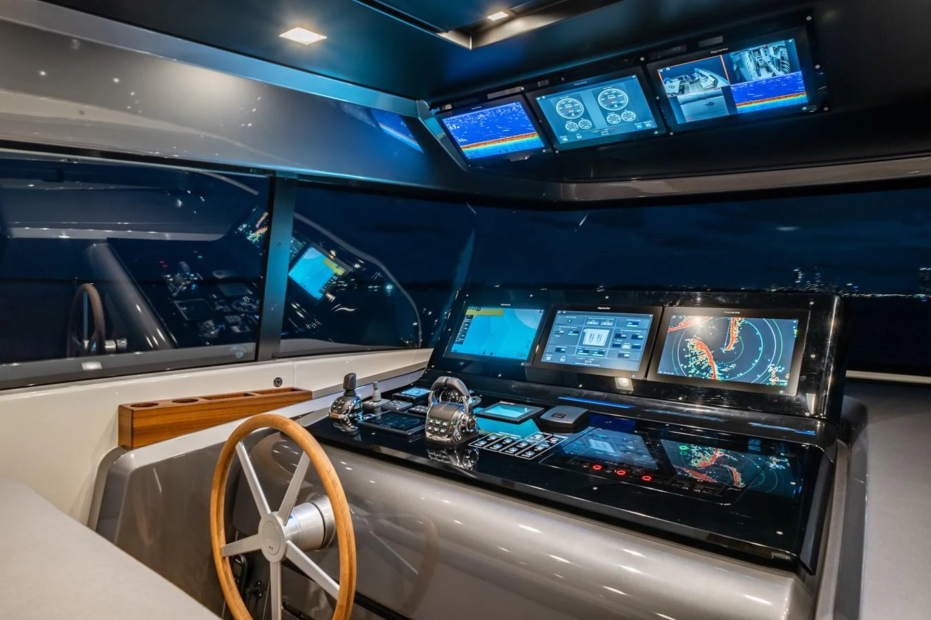 The helm station features advanced navigation equipment and a sleek, modern design. aboard VIOLETTA Yacht for Sale