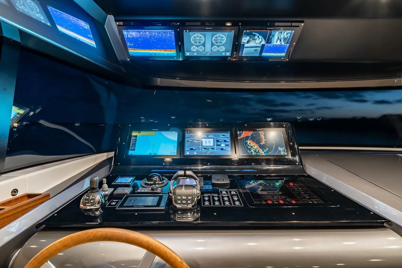 The helm station is equipped with advanced navigation and control systems, offering a sleek and modern design. aboard VIOLETTA Yacht for Sale