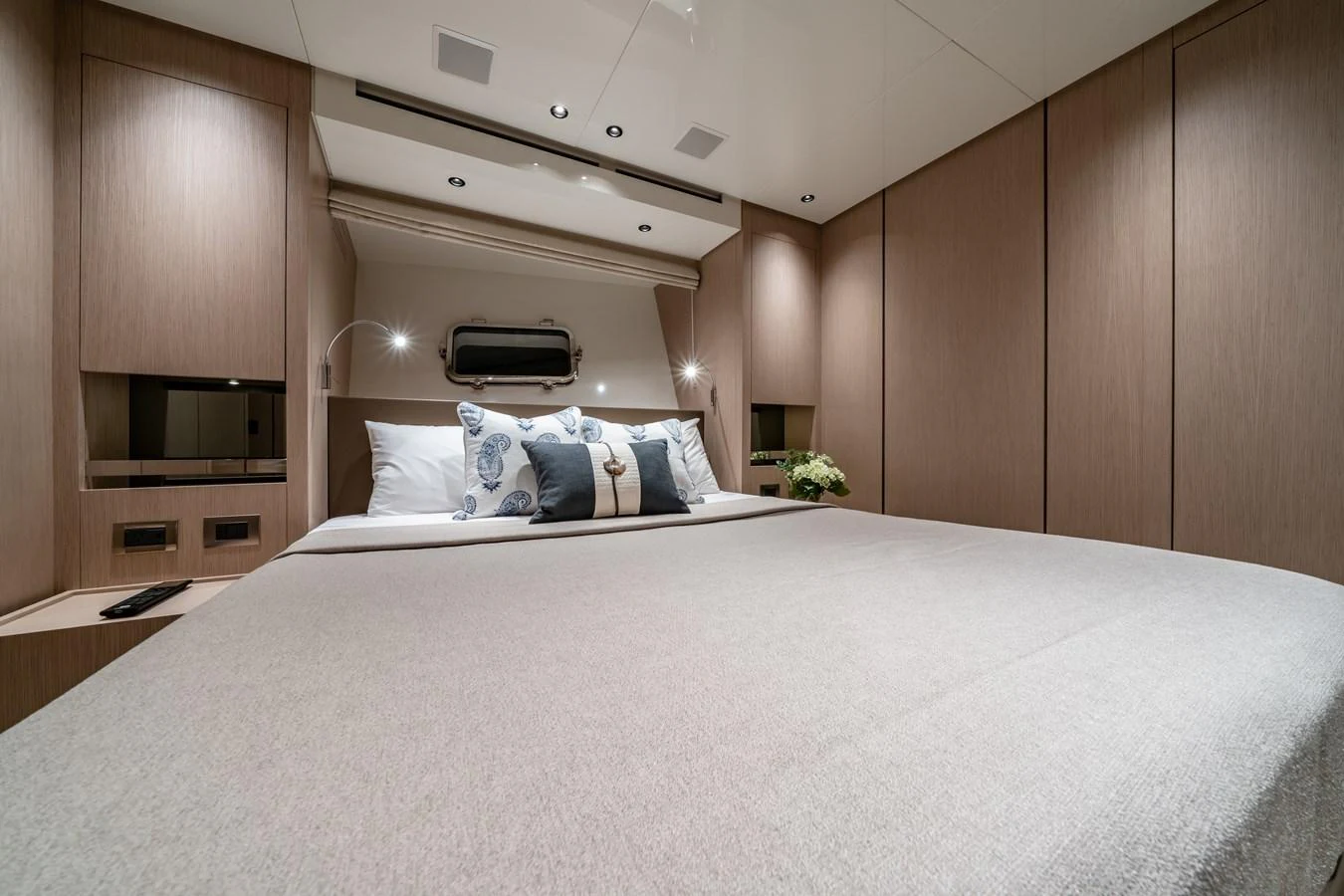 This cozy stateroom features a plush bed with elegant bedding and ample storage space. aboard VIOLETTA Yacht for Sale