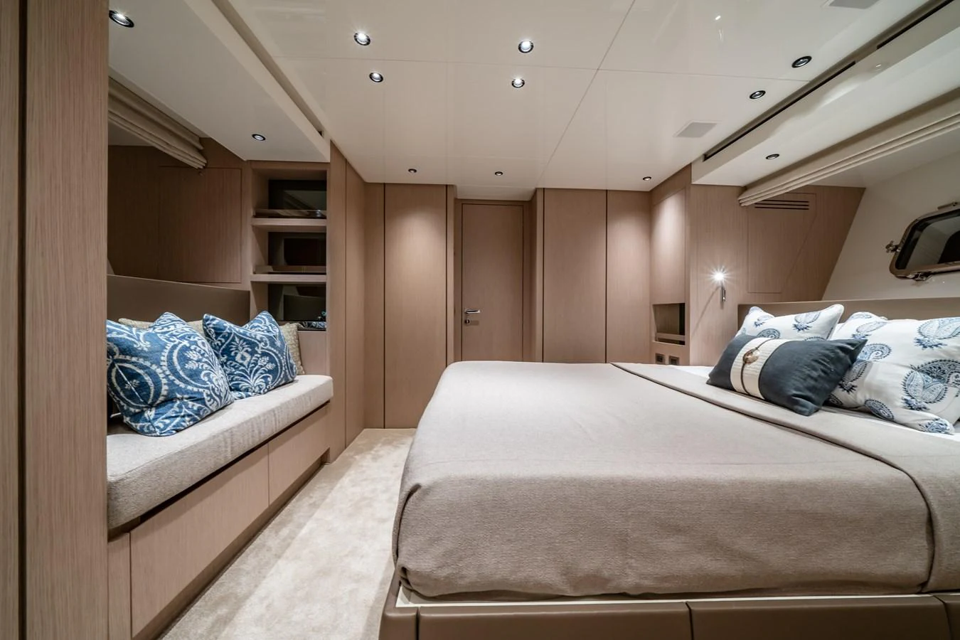The stateroom features a spacious bed with elegant bedding and ample storage space. aboard VIOLETTA Yacht for Sale