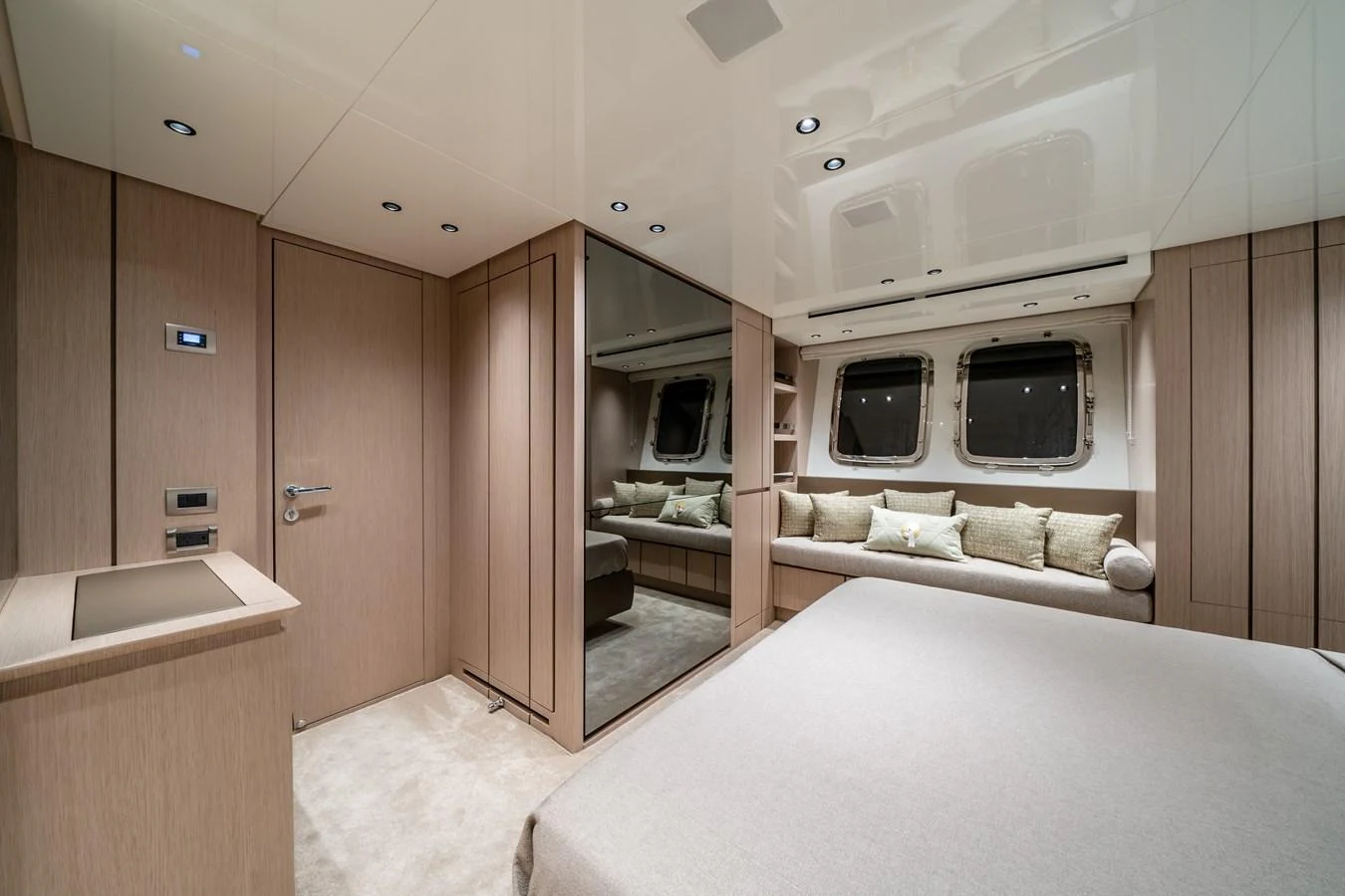The stateroom features a luxurious bed, ample storage, and large windows for natural light. aboard VIOLETTA Yacht for Sale