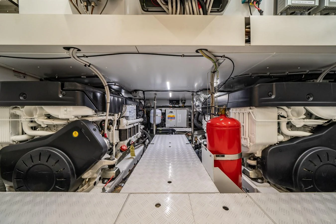 The image showcases the pristine and well-organized engine room of the yacht, highlighting its advanced mechanical systems. aboard VIOLETTA Yacht for Sale
