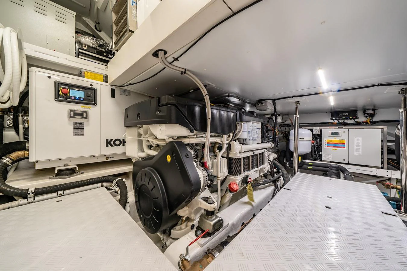 The image showcases the well-maintained engine room of the yacht, highlighting its advanced machinery and clean layout. aboard VIOLETTA Yacht for Sale