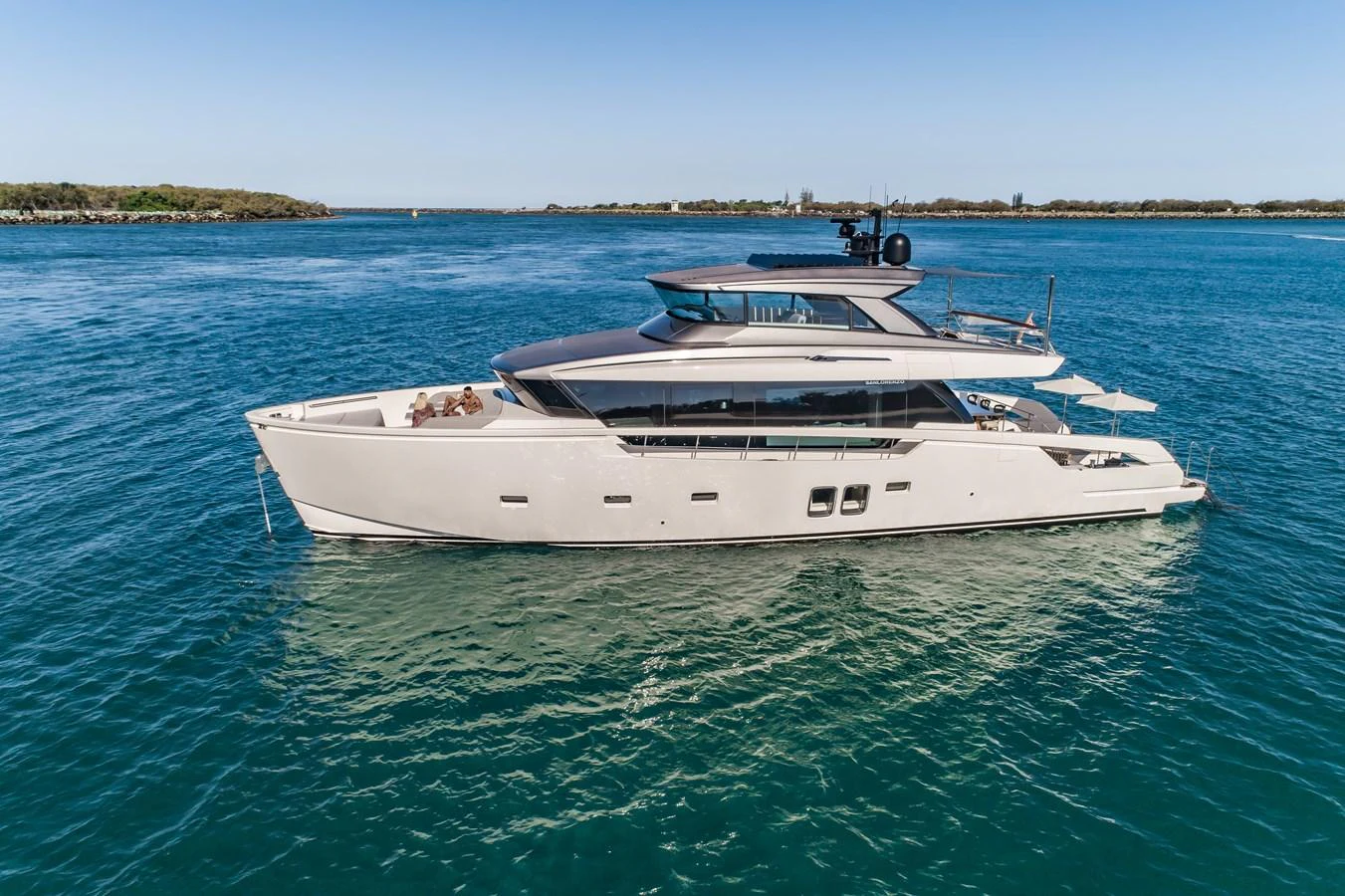 A sleek and modern yacht glides gracefully on the calm blue waters. aboard VIOLETTA Yacht for Sale