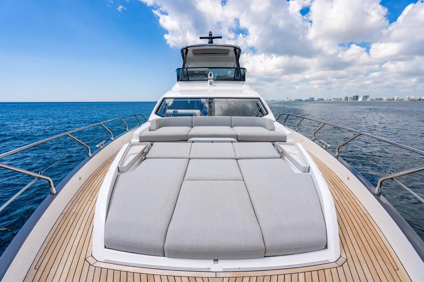 The foredeck features luxurious sun pads with a stunning view of the open sea. aboard EFFORTLESS Yacht for Sale