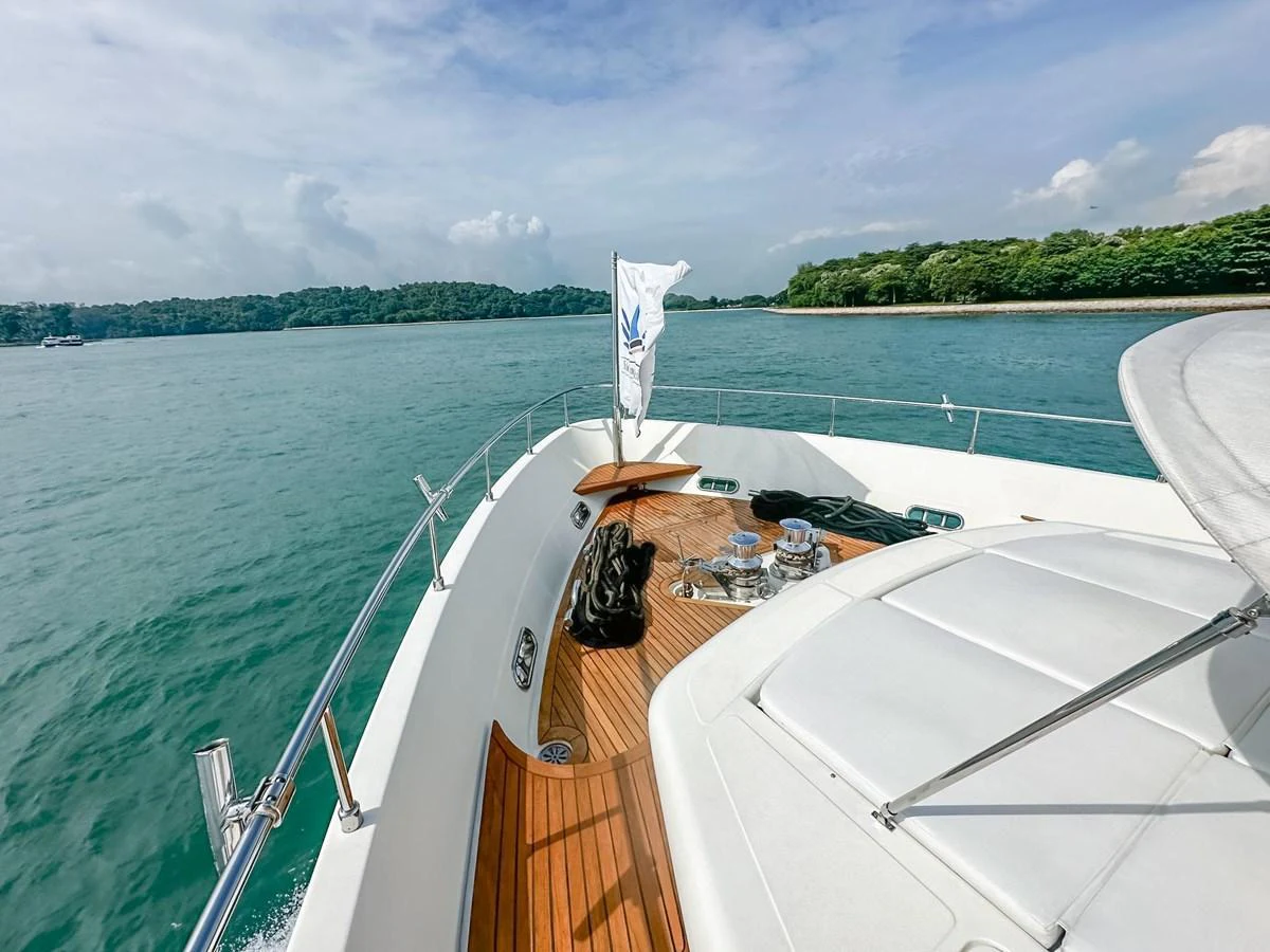 The foredeck offers a spacious and inviting area for relaxation with stunning views of the surrounding waters. aboard CUSTOM LINE 112 Yacht for Sale