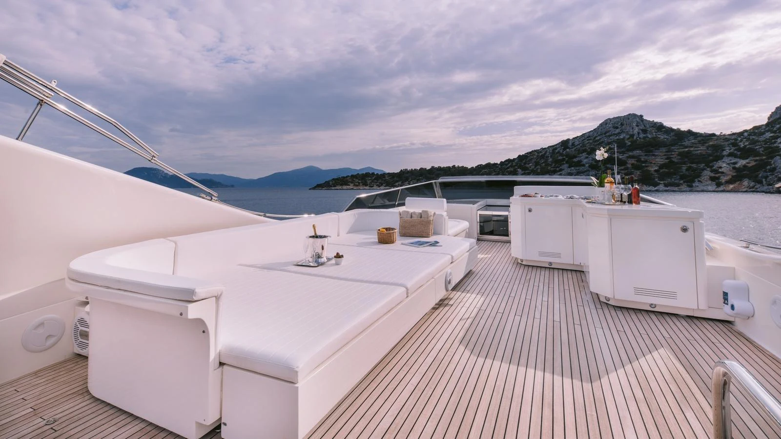 The sundeck offers a luxurious space for relaxation with stunning views of the surrounding waters. aboard THIS IS MINE Yacht for Sale