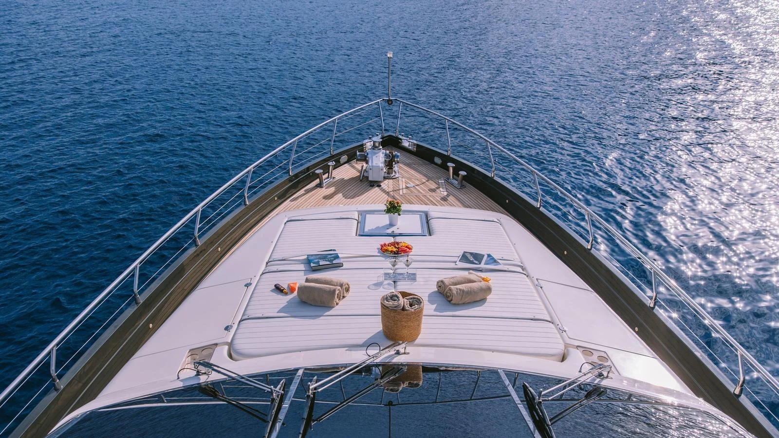 The foredeck offers a serene space for relaxation with stunning ocean views. aboard THIS IS MINE Yacht for Sale