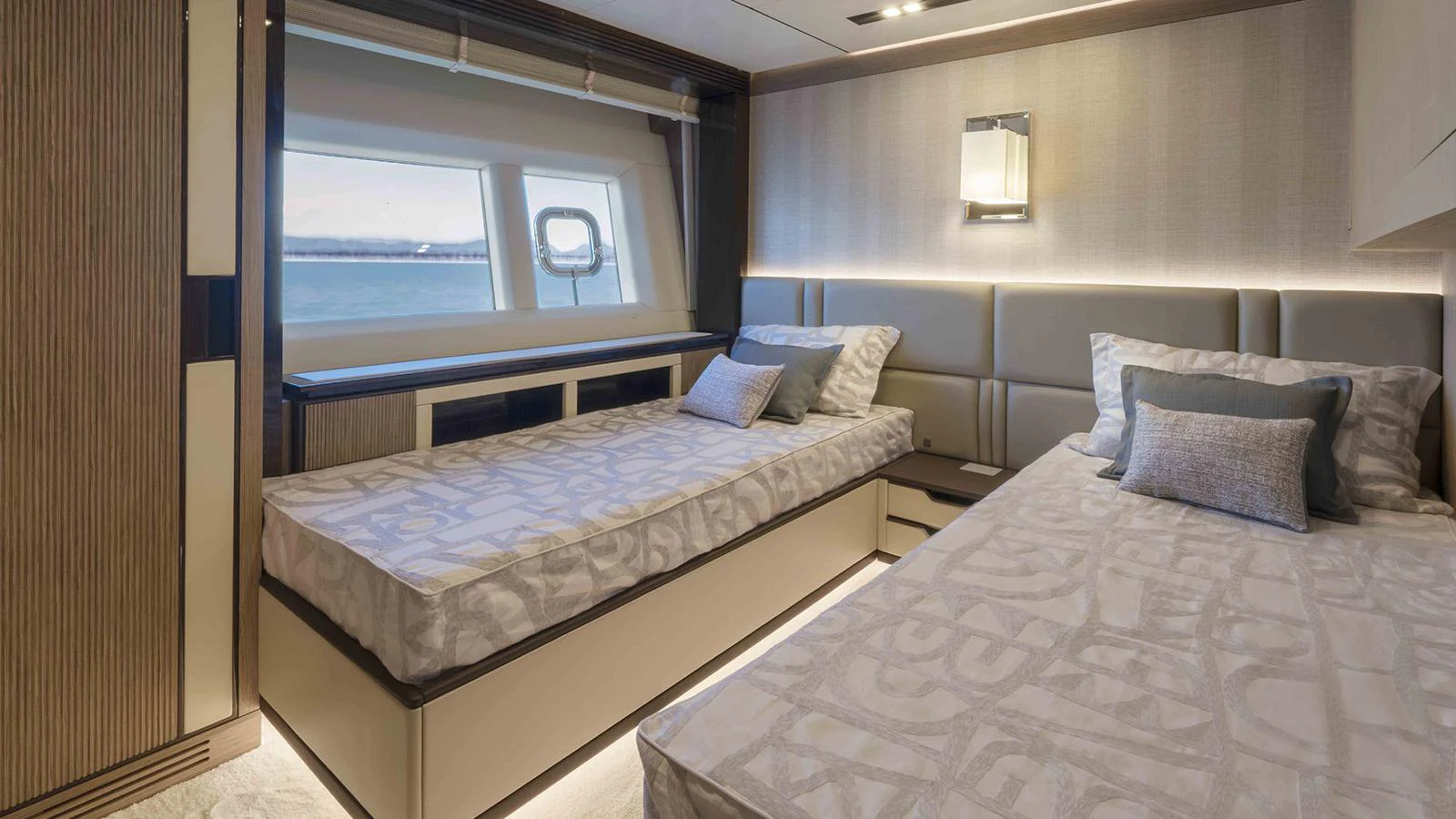 a room with two beds aboard FOUR JOYS Yacht for Sale