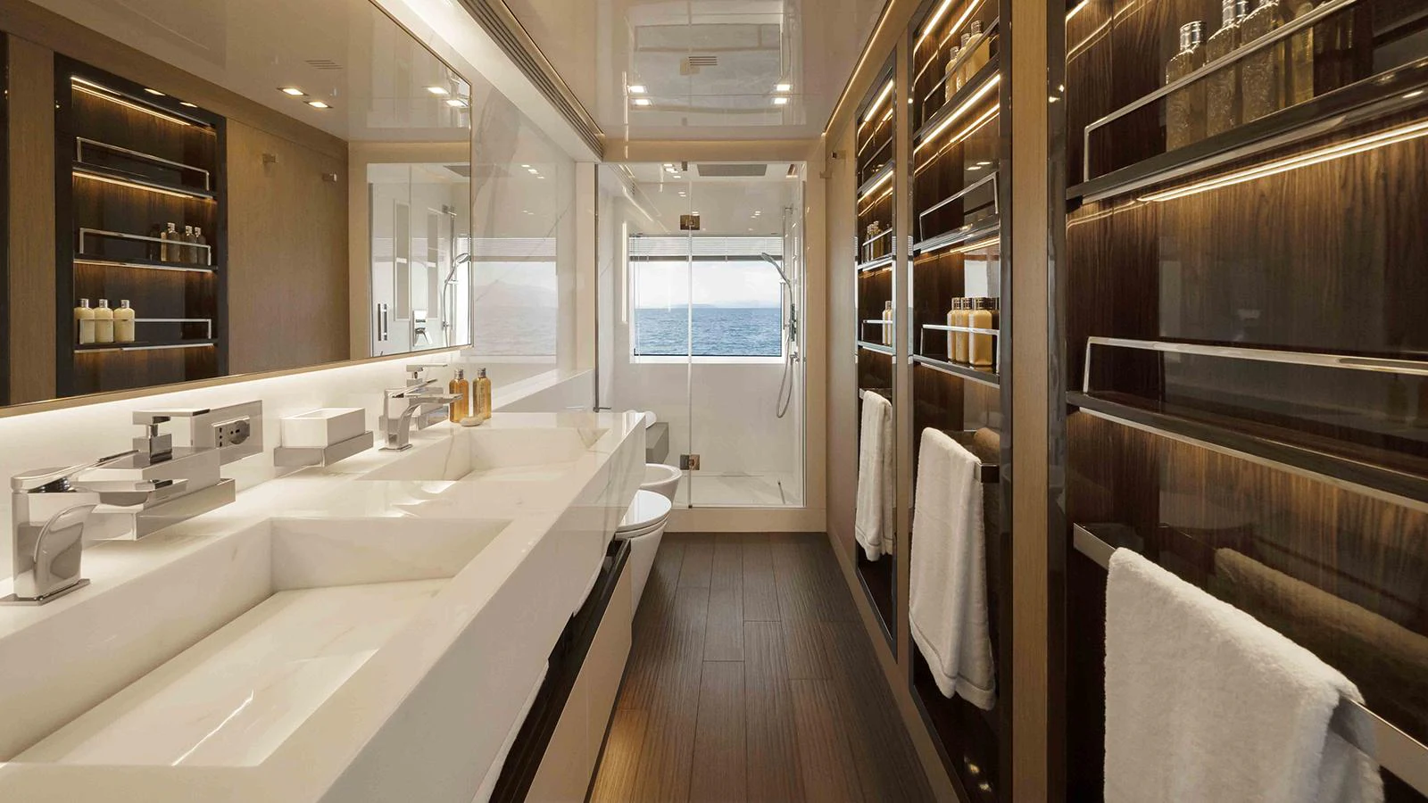 a bathroom with a large mirror aboard FOUR JOYS Yacht for Sale