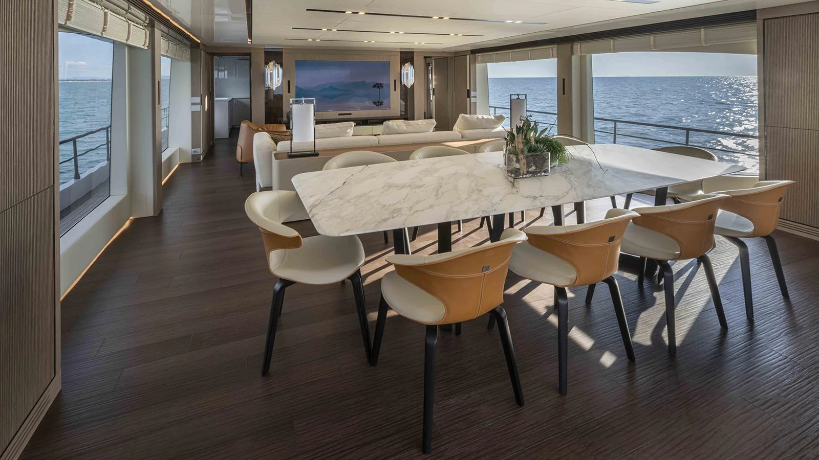 a large room with a table and chairs aboard FOUR JOYS Yacht for Sale