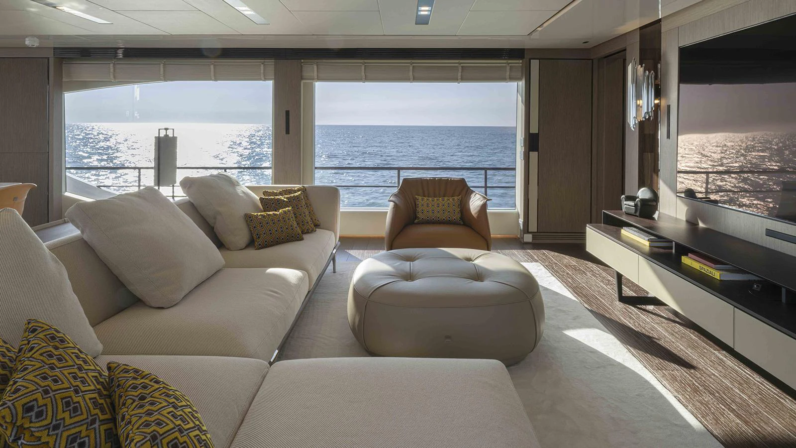 a living room with a large window aboard FOUR JOYS Yacht for Sale