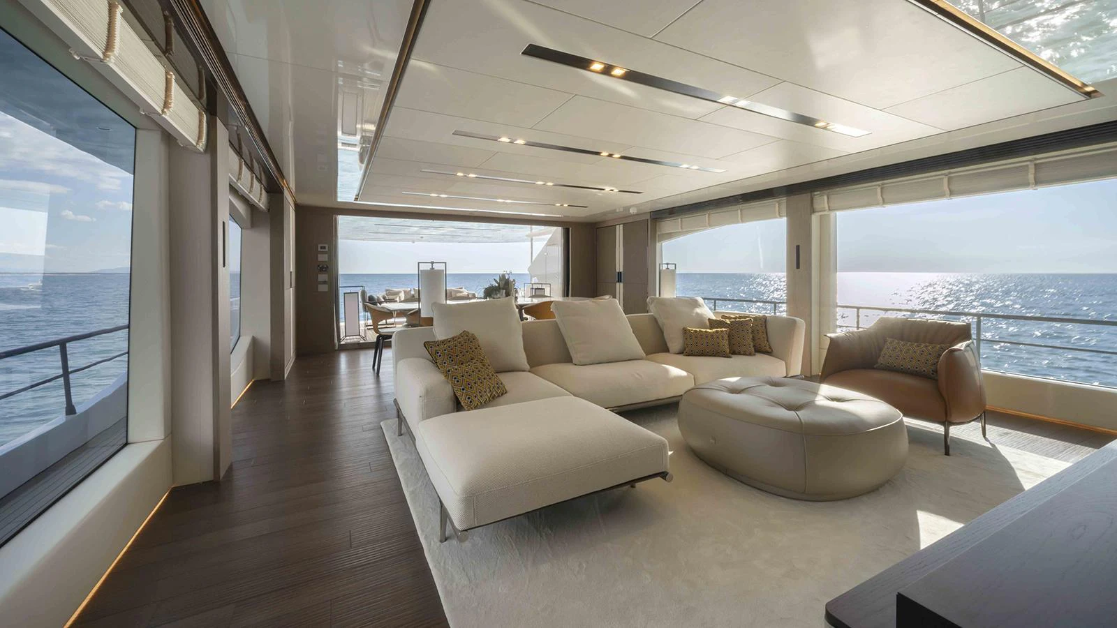 a living room with a large window aboard FOUR JOYS Yacht for Sale