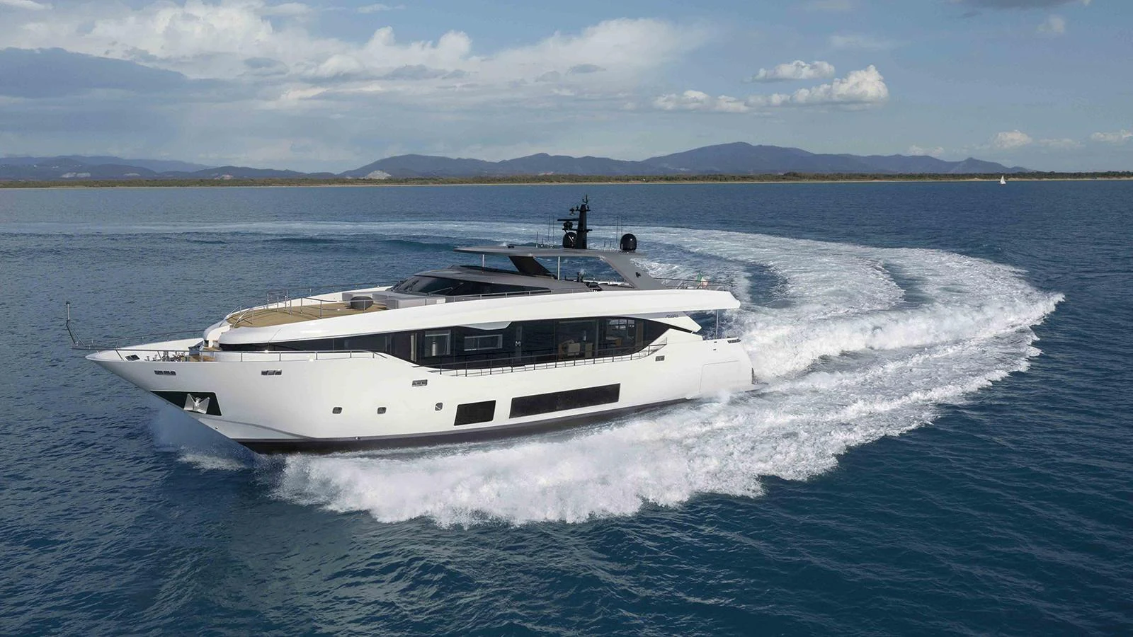 a white yacht on the water aboard FOUR JOYS Yacht for Sale