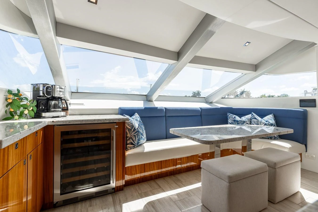 The yacht's dining area features a sleek design with ample natural light and comfortable seating. aboard RITZ SEA Yacht for Sale