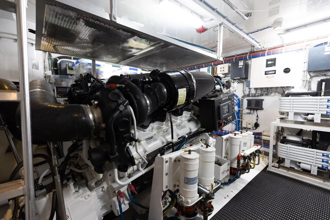 The image showcases the meticulously organized engine room of the yacht, highlighting its advanced machinery and clean layout. aboard RITZ SEA Yacht for Sale