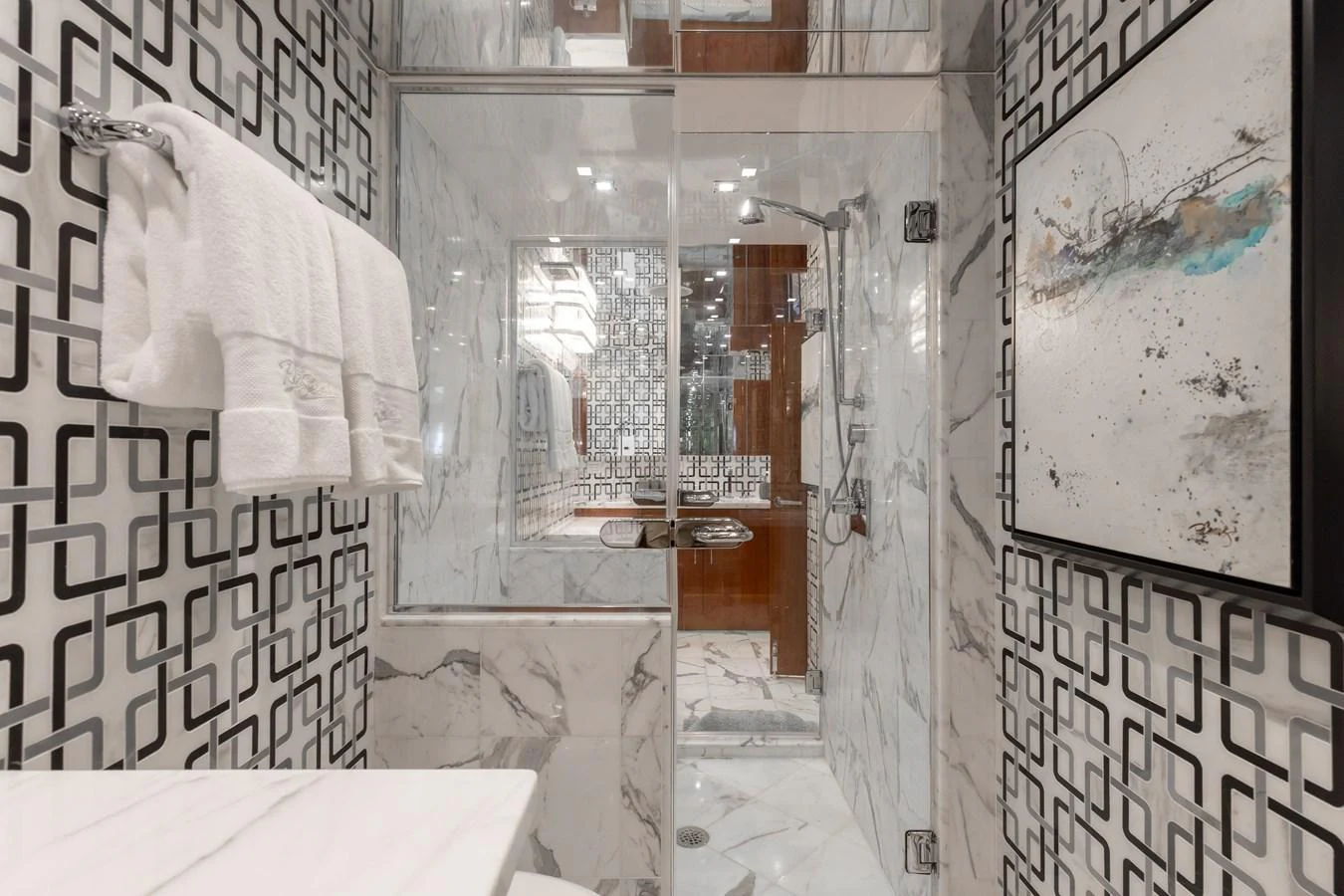 The yacht's bathroom features luxurious marble finishes and modern fixtures. aboard RITZ SEA Yacht for Sale