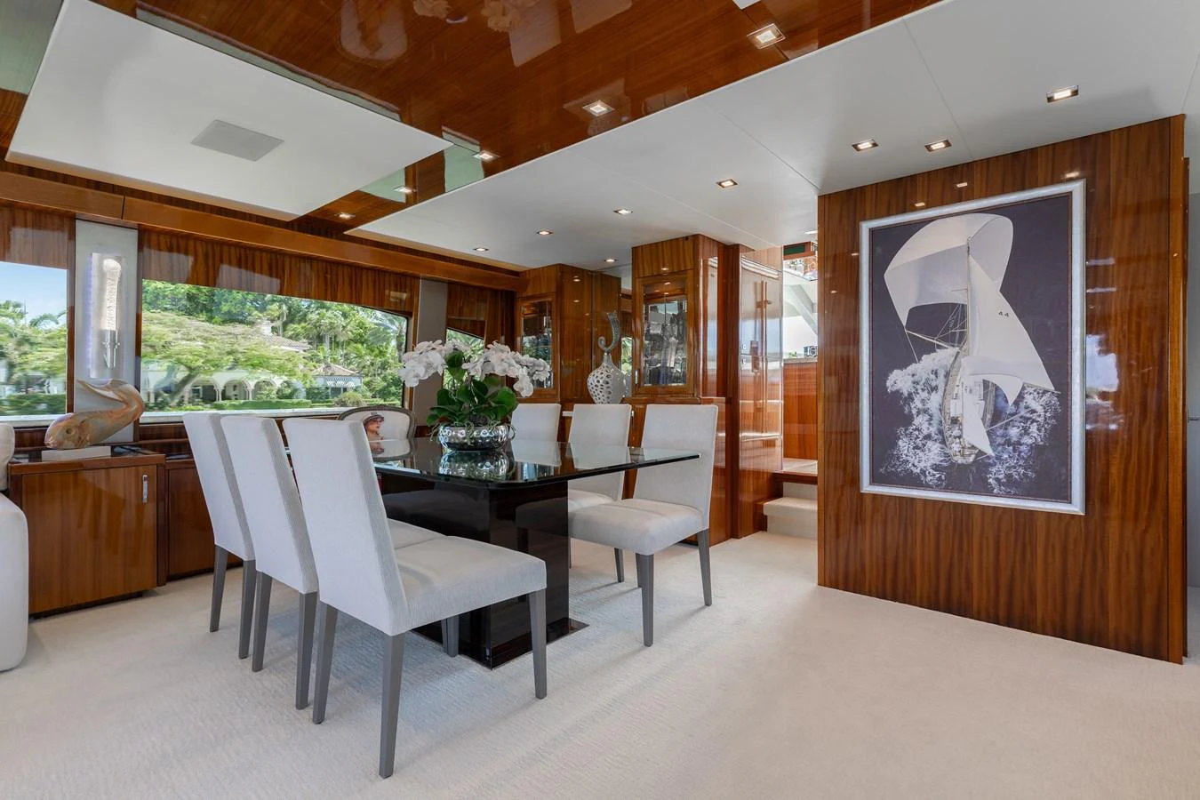The yacht's dining area features elegant furnishings and a sophisticated ambiance. aboard RITZ SEA Yacht for Sale