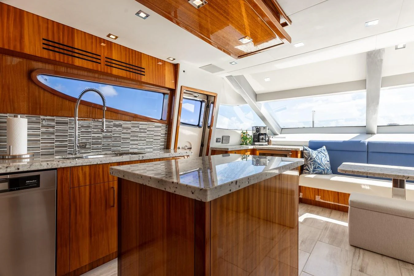 The yacht's galley features modern appliances, sleek countertops, and ample natural light. aboard RITZ SEA Yacht for Sale