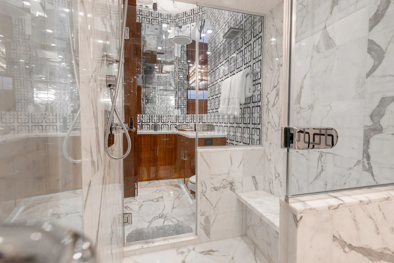 The yacht's bathroom features luxurious marble finishes and modern fixtures. aboard RITZ SEA Yacht for Sale