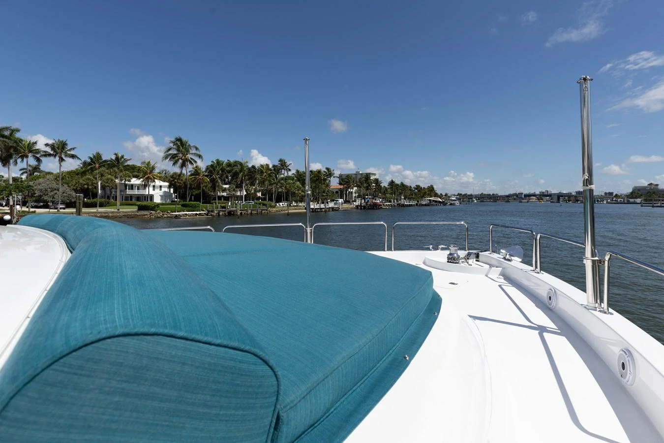 The yacht's bow area features a spacious sunpad with a scenic view of the waterfront. aboard RITZ SEA Yacht for Sale