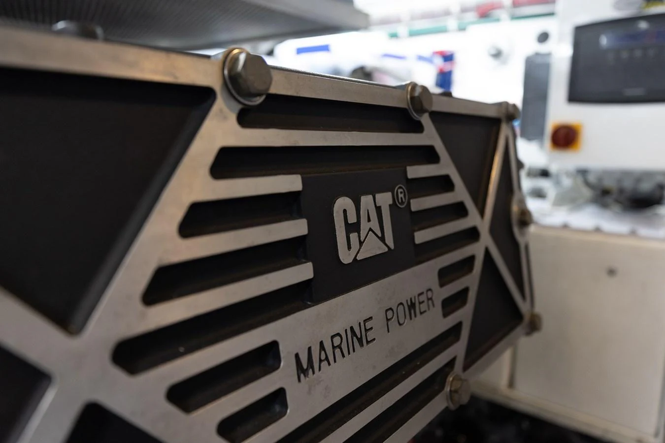 A close-up view of a CAT marine power engine component, showcasing its robust construction. aboard RITZ SEA Yacht for Sale