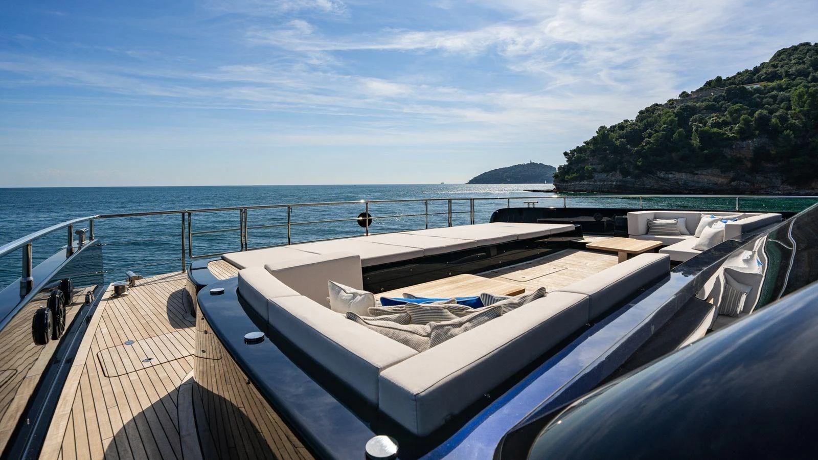The sundeck offers a luxurious lounging area with stunning ocean views. aboard PETITE BELLE Yacht for Sale