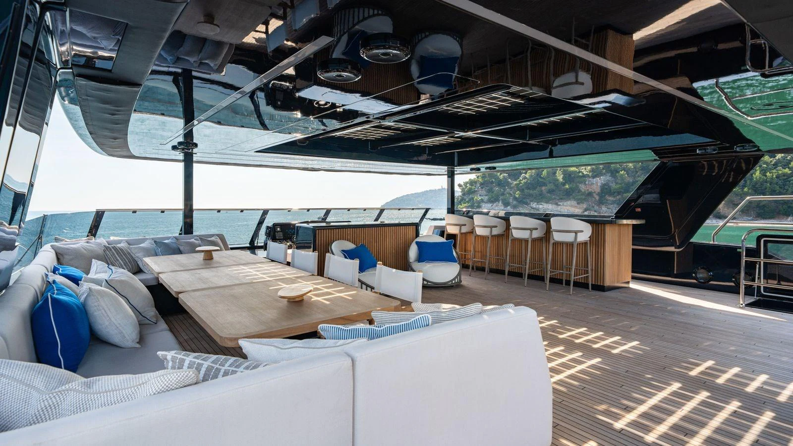 The flybridge offers a spacious and luxurious seating area with panoramic views. aboard PETITE BELLE Yacht for Sale