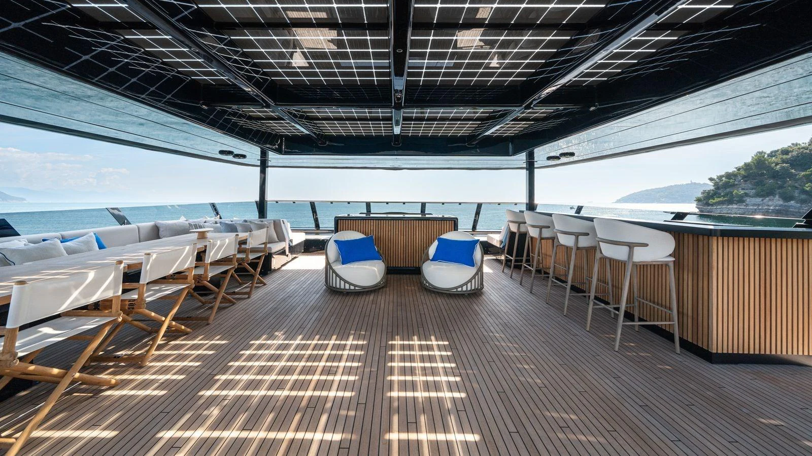 The sundeck offers a spacious and stylish area for relaxation and socializing with stunning sea views. aboard PETITE BELLE Yacht for Sale