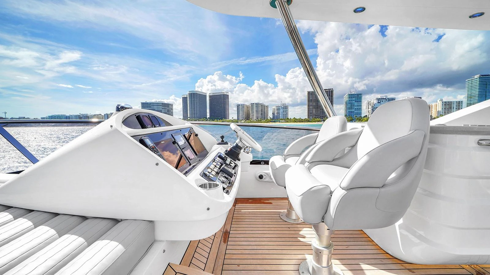 a white boat on a deck aboard M4 Yacht for Sale