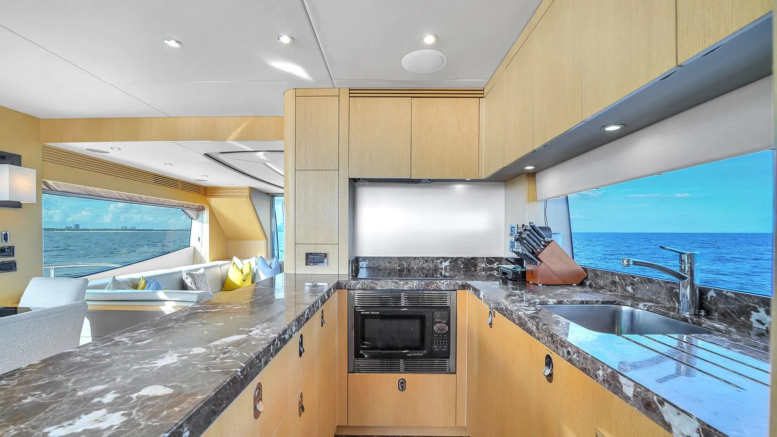 a kitchen with a large island aboard M4 Yacht for Sale