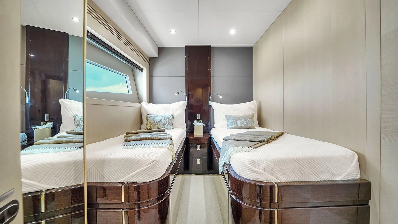 a couple of beds in a hotel room aboard M4 Yacht for Sale