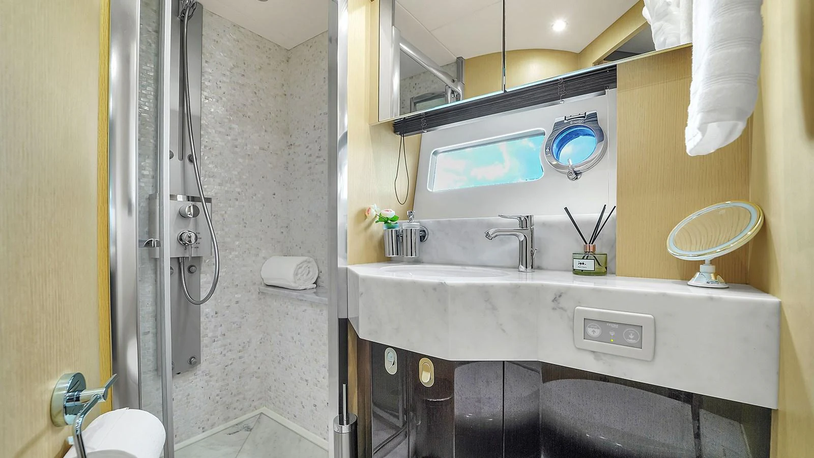 a bathroom with a sink and a mirror aboard M4 Yacht for Sale