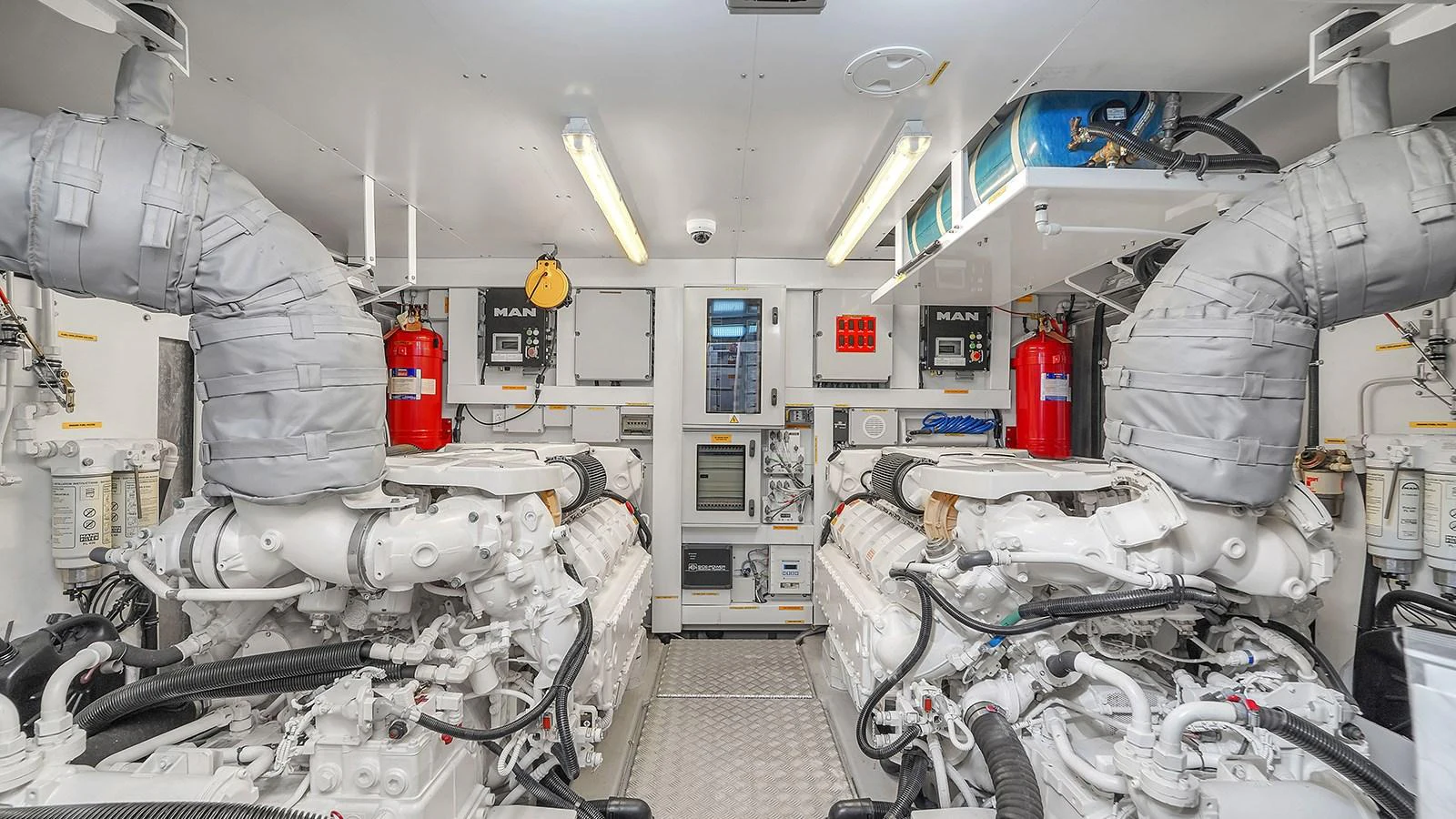 a room with a machine and machinery aboard M4 Yacht for Sale
