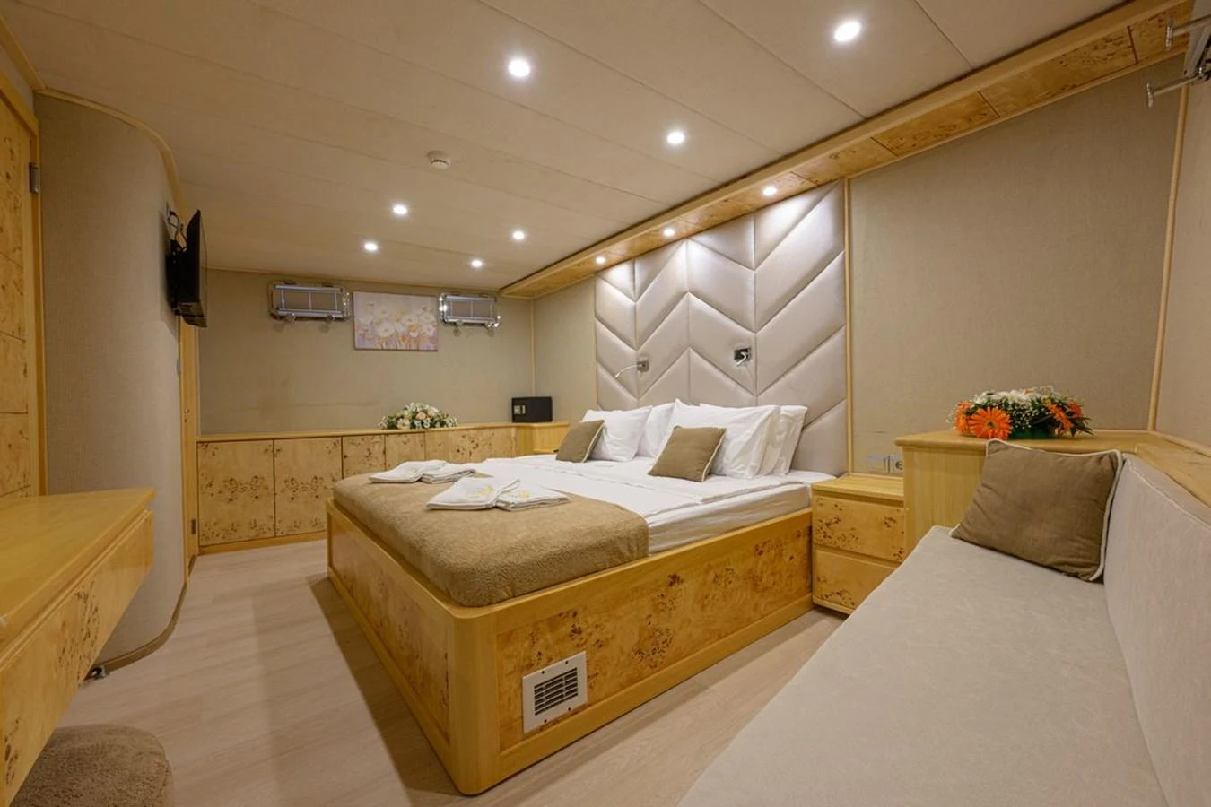 The stateroom features a cozy bed, soft lighting, and elegant decor, providing a comfortable and luxurious retreat. aboard BELGIN SULTAN Yacht for Sale