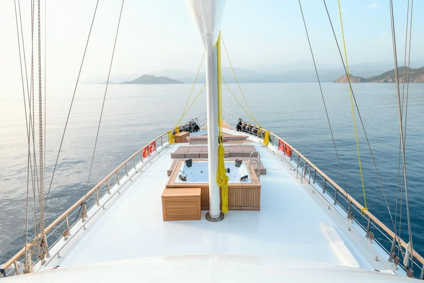 The foredeck offers a spacious and serene area with sunbeds and a stunning view of the sea. aboard BELGIN SULTAN Yacht for Sale