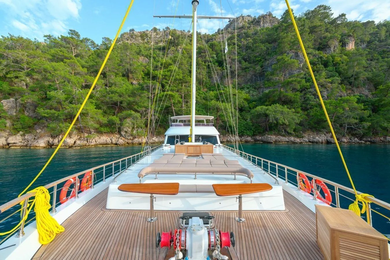 The foredeck of the yacht offers a spacious lounging area with scenic views of the surrounding nature. aboard BELGIN SULTAN Yacht for Sale