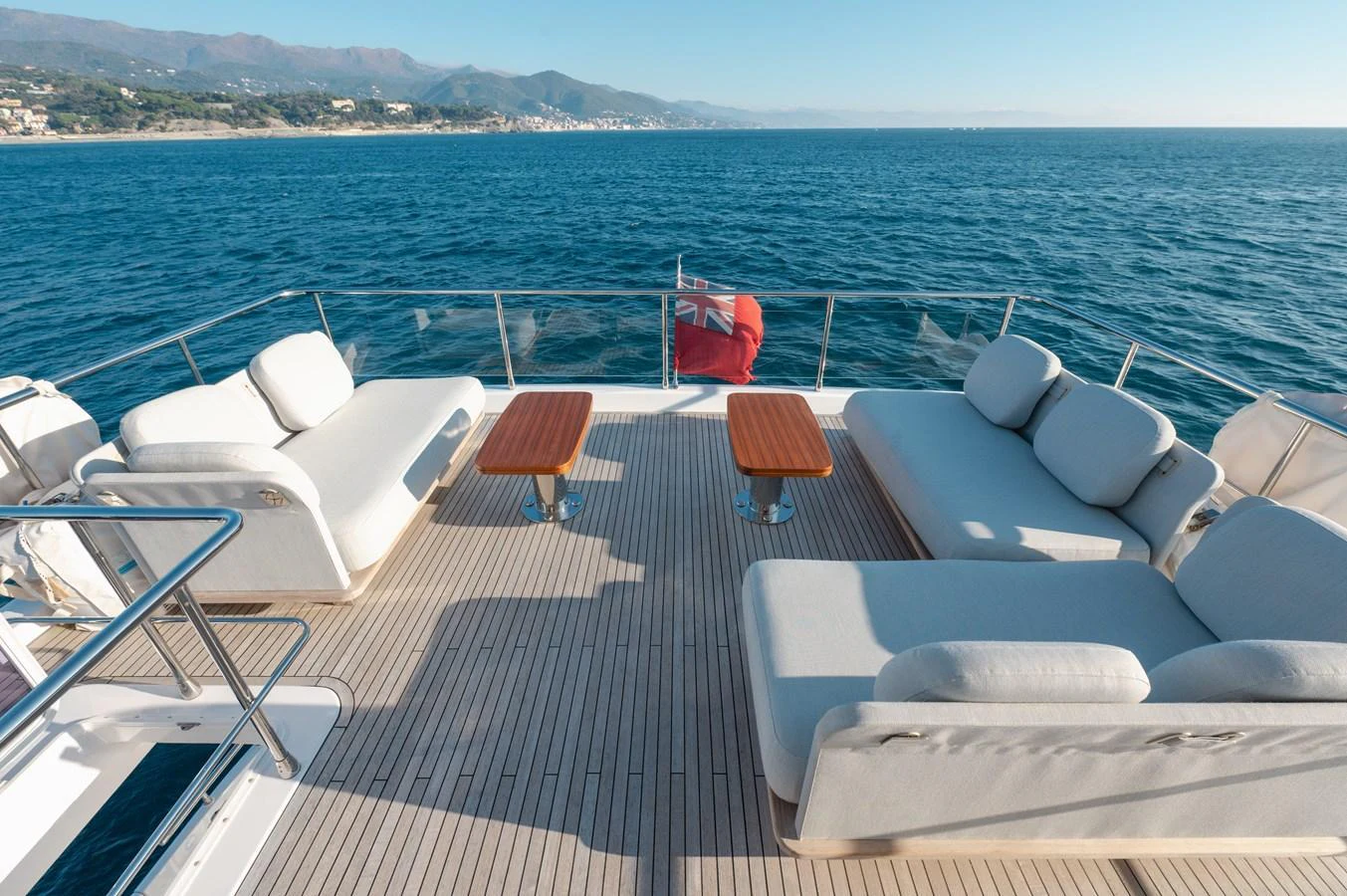 The aft deck offers a spacious and comfortable lounging area with stunning ocean views. aboard HELSIE SI Yacht for Sale