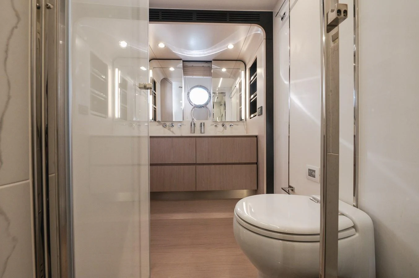 The yacht's bathroom features modern fixtures and a sleek design. aboard HELSIE SI Yacht for Sale
