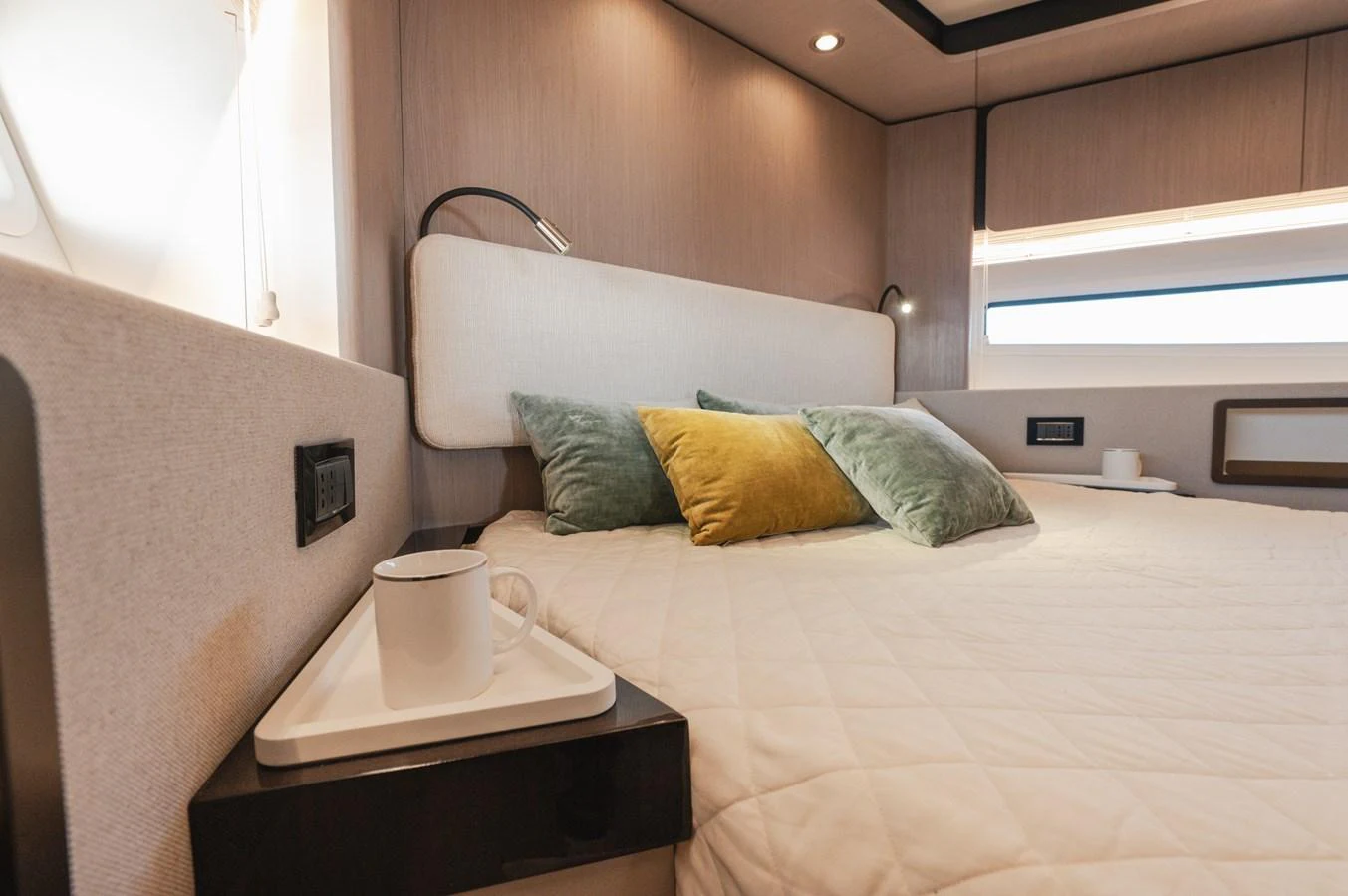 A cozy stateroom with a comfortable bed and soft lighting. aboard HELSIE SI Yacht for Sale