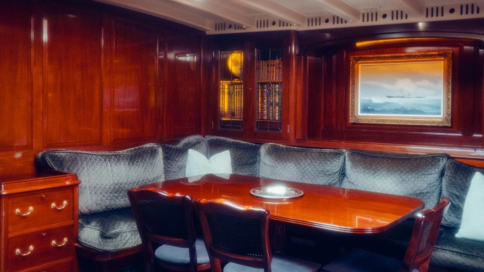 a room with a couch and a table aboard SAVANNAH Yacht for Sale