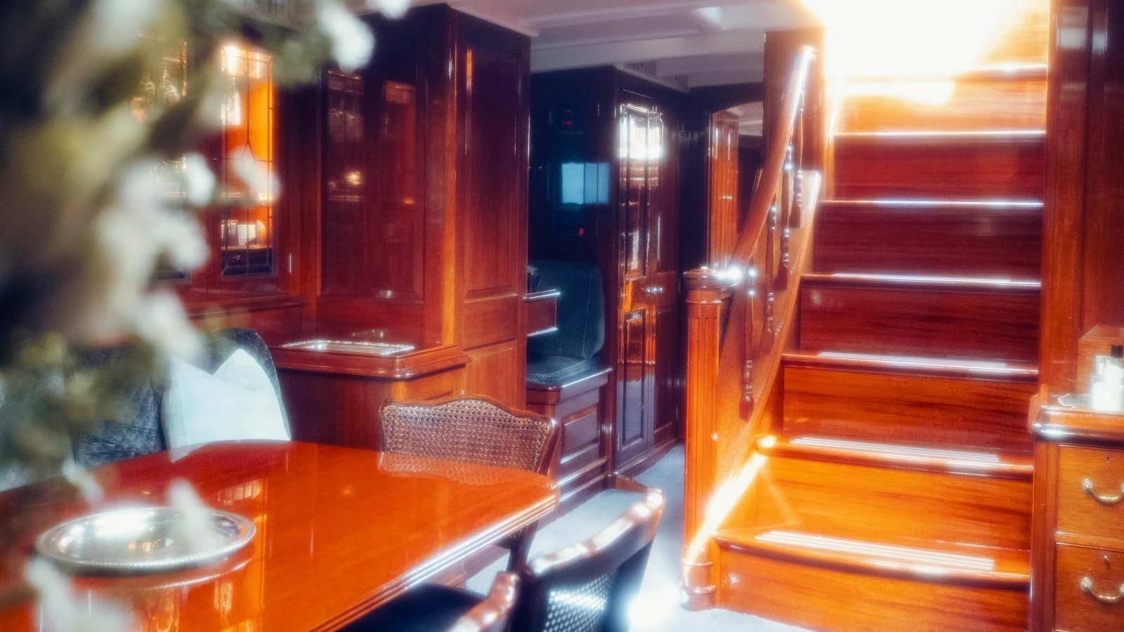 a person sitting at a table aboard SAVANNAH Yacht for Sale