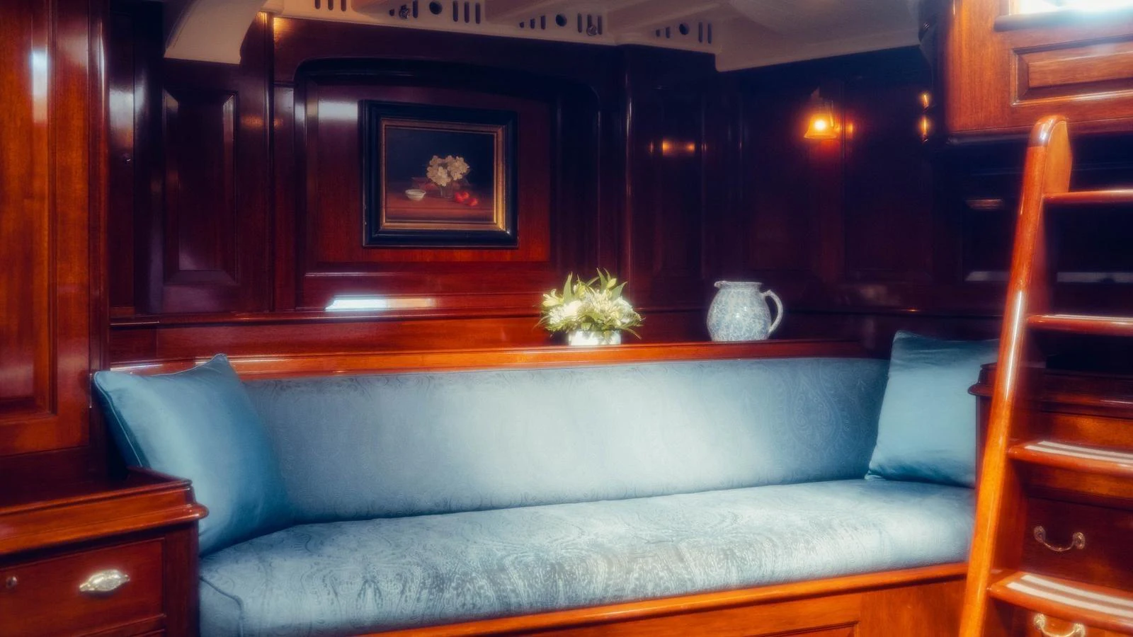 a couch in a room aboard SAVANNAH Yacht for Sale
