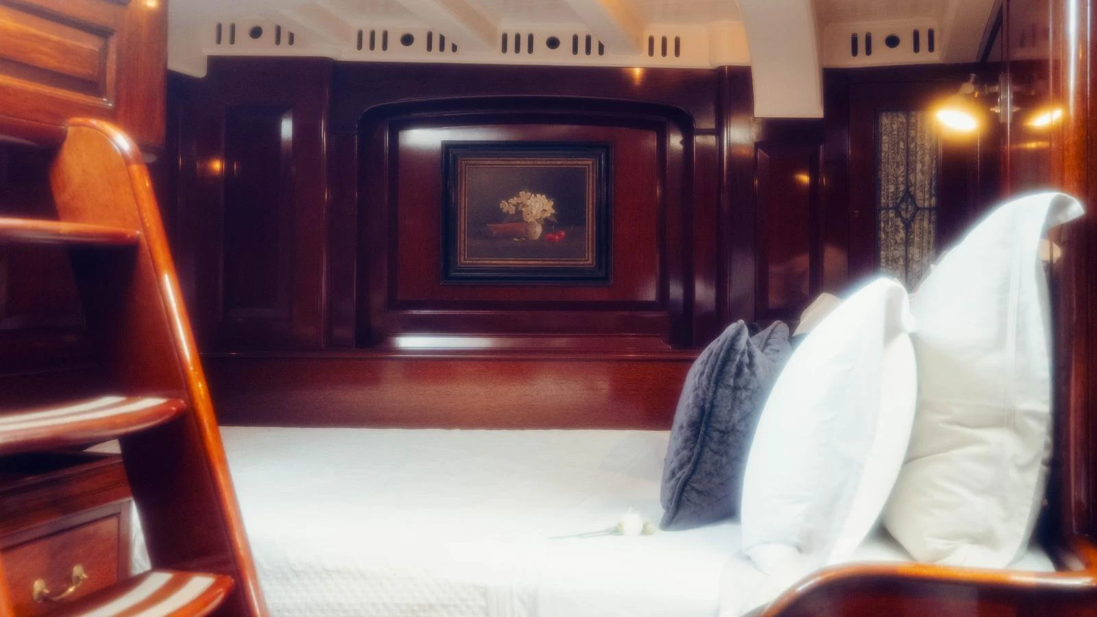 a room with a couch and a television aboard SAVANNAH Yacht for Sale