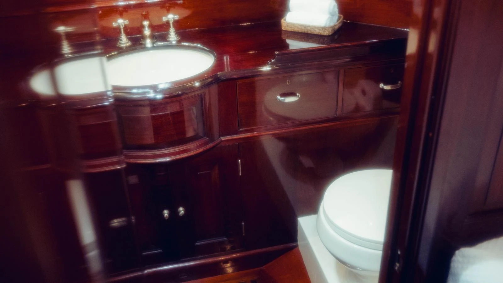 a bathroom with a sink and toilet aboard SAVANNAH Yacht for Sale