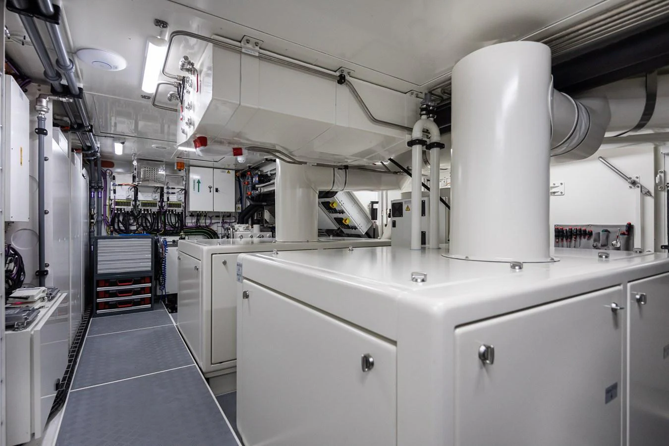 The yacht's engine room is equipped with advanced machinery and neatly organized systems. aboard CANOVA Yacht for Sale