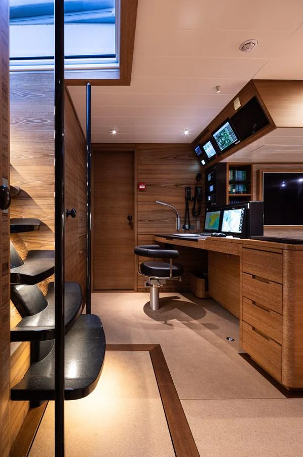 The yacht's helm features a sleek, modern design with advanced navigation equipment and comfortable seating. aboard CANOVA Yacht for Sale