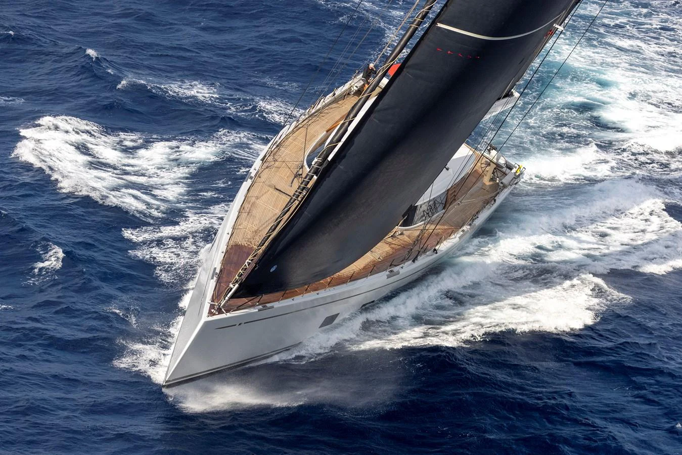 A sleek sailing yacht cuts through the waves with impressive speed. aboard CANOVA Yacht for Sale